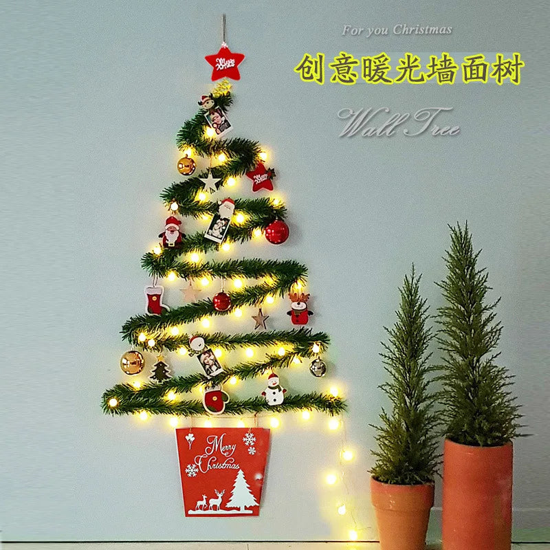 Christmas Wall Tree with glowing lights and DIY ornaments.